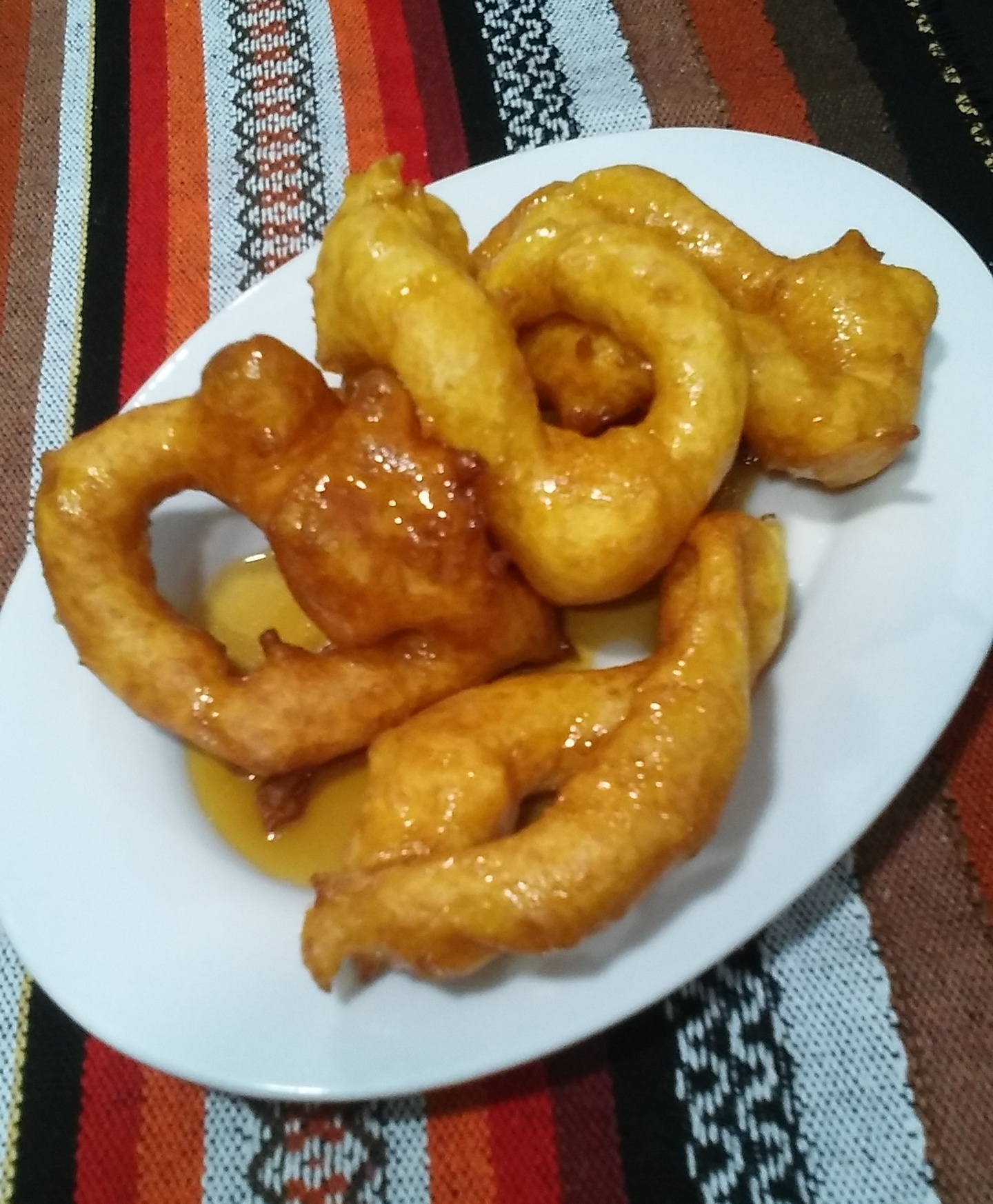 Picarones with chancaca syrup